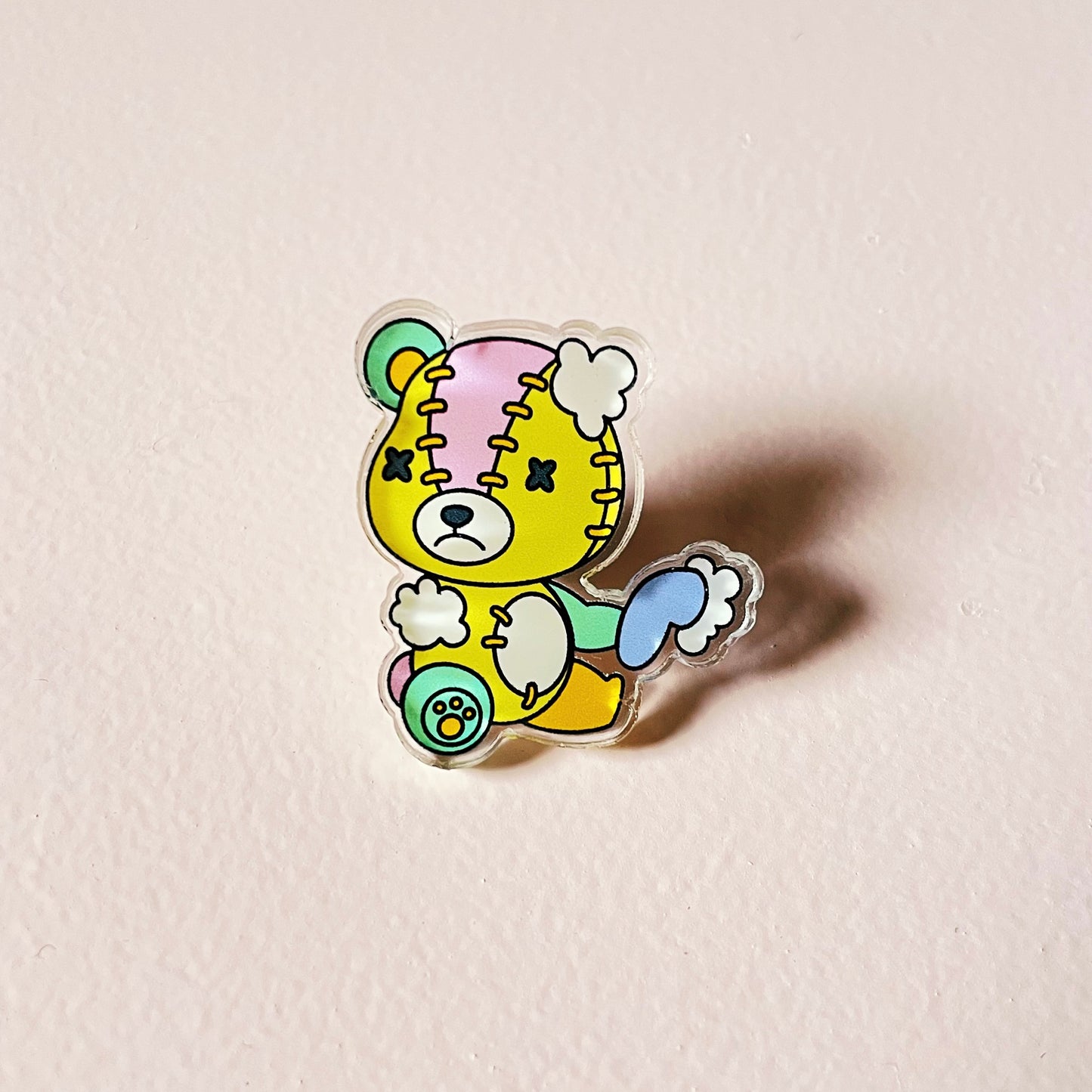 Stitches acrylic pin